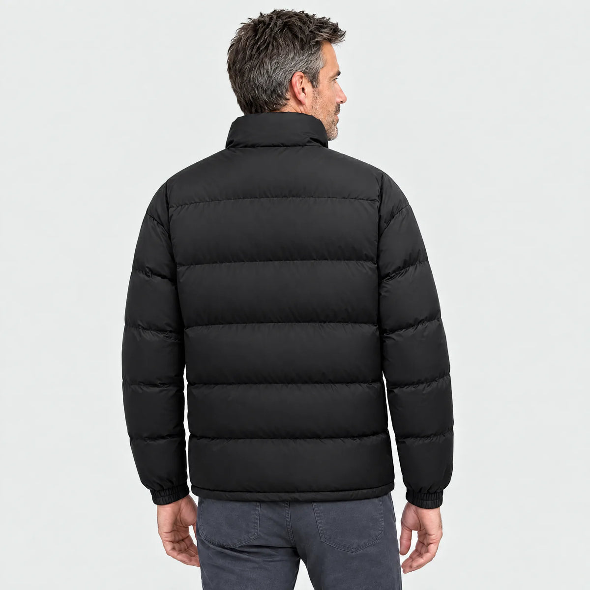 The black heated puffer jacket from behind