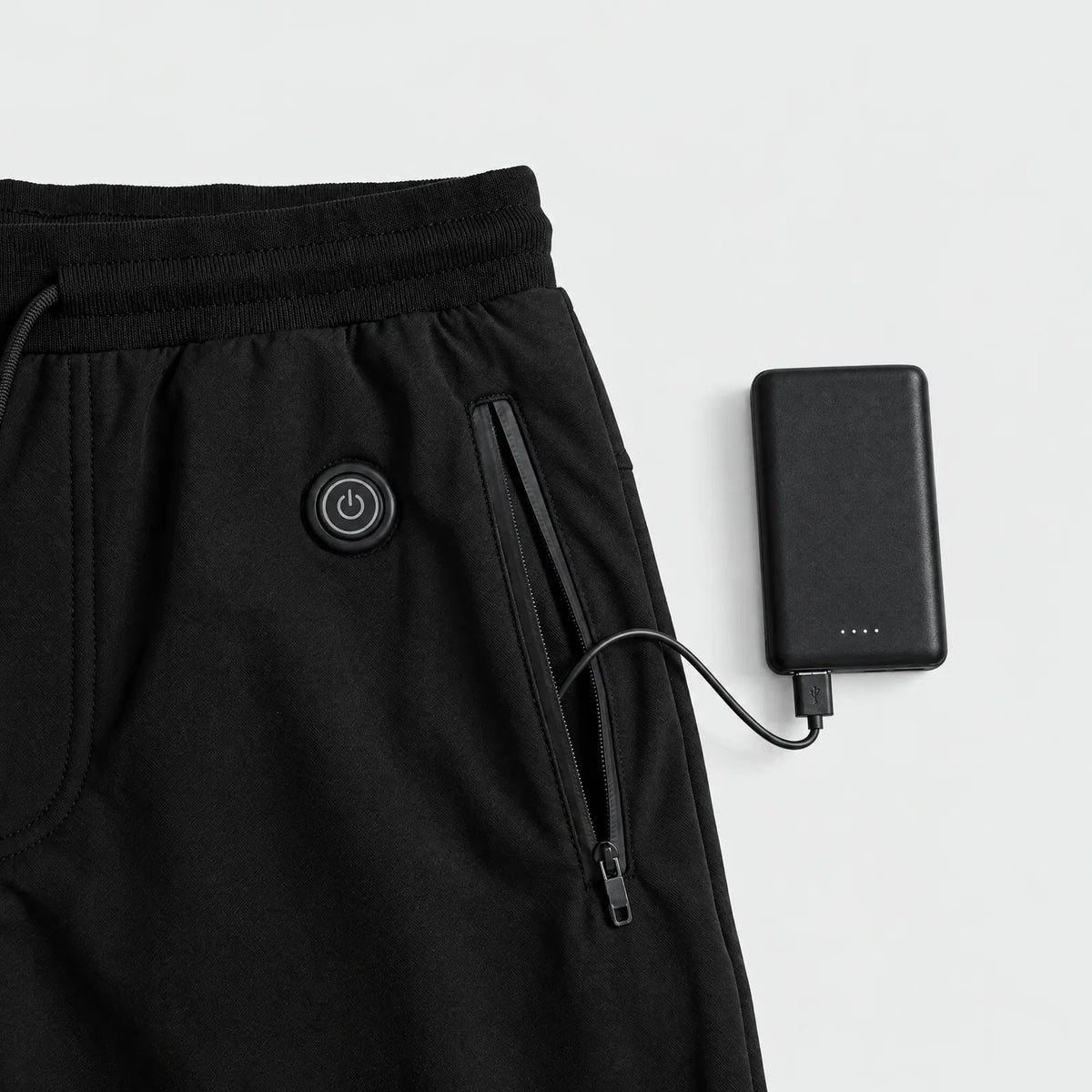 Button below the waistband and power bank at the side pocket