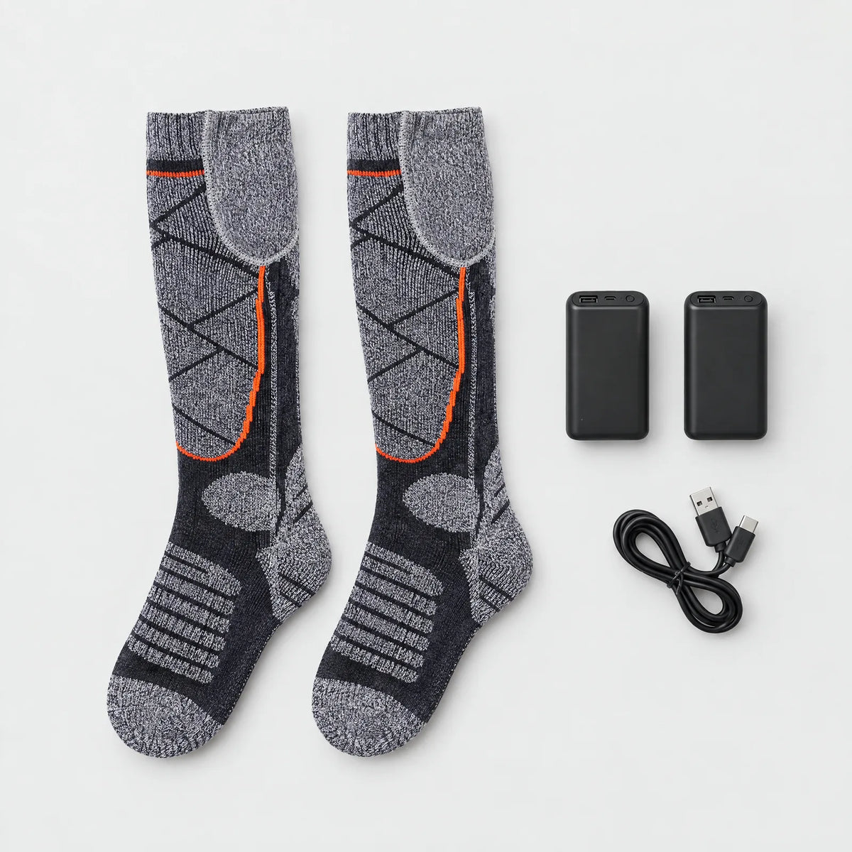 In the box: a pair of heated socks, two batteries and a USB charging cable