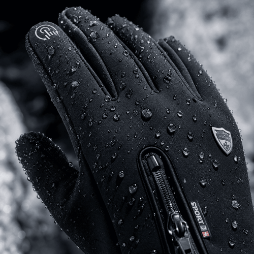 Close-up of the glove with water beading on the repellent outer fabric